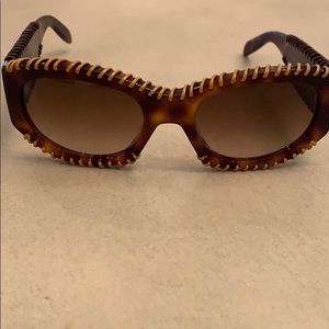 Authentic Burberry sunglasses with Authentic case.